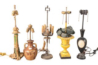 Group of Five Table Lamps, to include a black two light lamp with inset busts; a yellow metal two light lamp with leaf forms; a five light classical f