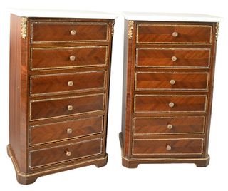 Pair of French Bronze Mounted Miniature Chests, each having six drawers and marble tops, height 18 1/4 inches, width 11 1/4 inches.