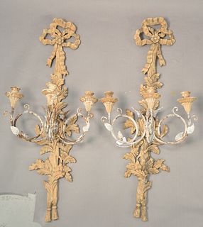 Pair of Italian Carved Wood and Tole Sconces, each having three lights on scrolling arms with bow form on top, length 36 1/2 inches, width 16 inches.