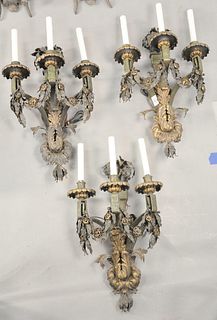 Group of Three Sterling Bronze Company Iron and Tole Wall Sconces, each having three lights and foliate decoration, length 25 1/2 inches, width 15 inc