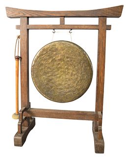 An American Oak Arts and Crafts Style Gong, height 29 inches.