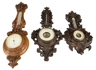 Three French and German Carved Wood Barometers, longest 24 inches.