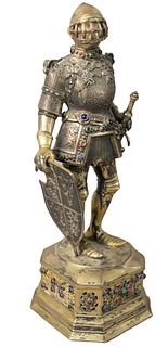 Sterling Silver Vermeil Knight having jeweled armor and standing on a base mounted with jewels, height 11 1/2 inches.