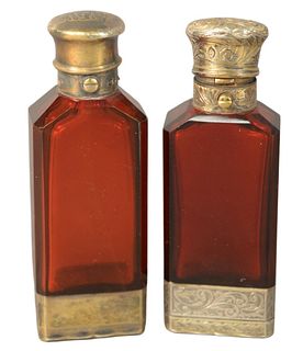 Two Silver and Cranberry Glass Vinaigrette Perfume Bottles having perfume on one end and vinaigrette on the other, one marked S. Mordan and Company Ma