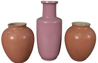 Three Piece Group of Chinese Porcelain Vases, to include a pair of pink crackle glazed vases, along with a purple glazed vase, each unmarked, heights 