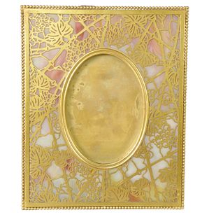 Tiffany Studios Grapevine Pattern Glass and Bronze Picture Frame, marked 'Tiffany Studios, New York, 946' height 10 inches, width 8 inches.