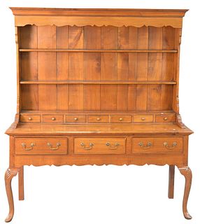 Two Part Welch Cupboard having open shelving over seven drawers sitting on base of three drawers and shell carved legs, height 75 inches, width 65 inc