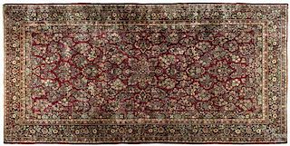 Sarouk carpet, ca. 1930, 23'4'' x 12'3''.