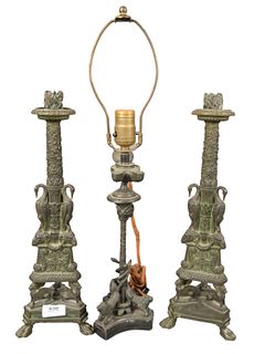 Three Piece Lot, to include a pair of bronze Grand Tour candlesticks both having cranes and winged lions on the base and ending in paw feet; along wit