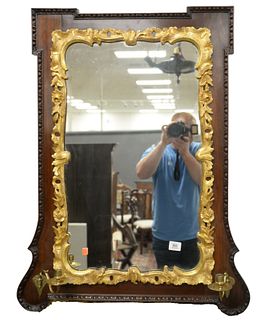 English Mahogany Girandole Mirror, having Rococo gilt liner mounted with pair of brass candle arm holders, 18th - early 19th century, height 39 inches