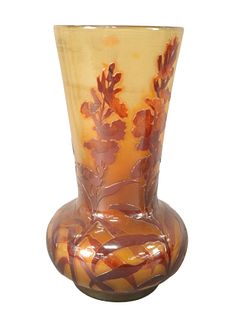 After Emile Galle Large Fire Polished Vase, having flared neck and red floral pattern, signed along the body "Galle" height 16 1/2 inches, width 7 1/2