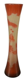 After Galle Tall Cameo Fire Polished Glazed Vase, having red lotus blossoms and leaves, inscribed "Galle" in cameo, height 22 inches.