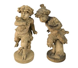 After Michel Claude Clodion (French, 1738 - 1814), pair of terracotta satyrs, one having a bird, the other carrying a nest of baby birds, height 10 in