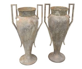 Pair of Iron Urns, mounted with handles, height 30 inches.