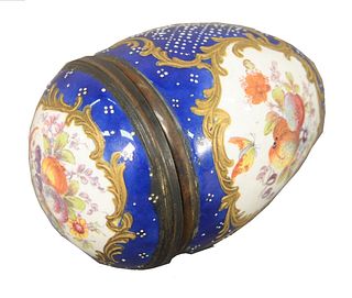 Battersea Bilston Enameled Egg Box, painted with birds, fruit and flowers on gilded cobalt blue ground, height 3 inches.