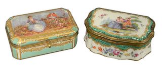 Two Meissen Porcelain Boxes, each having painted figures and metal mounted covers, marked with crossed swords, both lengths 3 inches.