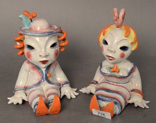 Pair of Walter Bosse (Austrian, 1904-1979), painted porcelain seated figures, both stamped "Bosse" to the underside, height 7 inches, width 6 inches, 