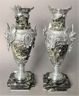 Pair of Green Marble and Silver Plate Mounted Urns, having winged cherub handles mounted on matching bases, height 16 1/2 inches, width 7 inches.