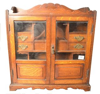 Oak Two Door Cabinet, having drawered interior, height 24 1/2 inches, width 22 inches.