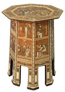 Egyptian Revival Octagonal Table, overall inlaid with Pharoah woman and people, height 25 inches, diameter 21 inches.