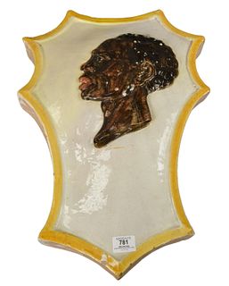 French Majolica Shield, having embossed black man, signed "Avret 1932" 24" x 17 1/2".