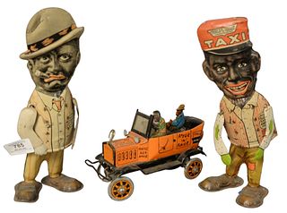 Three Marx Painted Tin Amos and Andy Wind Up Black Americana Toys, to include pair of walking Amos and Andy flat eye, height 11 1/2 inches; along with