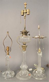 Three Piece Lot, to include a Baccarat crystal table lamp, marked to the underside; along with two 19th century or later cut crystal table lamps, havi