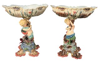 Pair of Eichwald Figural Majolica Compotes, having mermaid support holding crustacean shell bowl, all on shell feet, height 16 1/2 inches, width 15 in