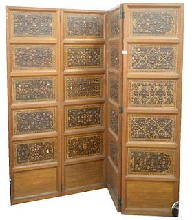 Oak Dressing Screen, having four panels with two sided embossed leather panels, height 79 inches, width 84 inches, (some damage to flowers).