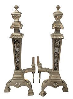 Pair of Tall Silvered Andirons, having log stops, height 28 inches.