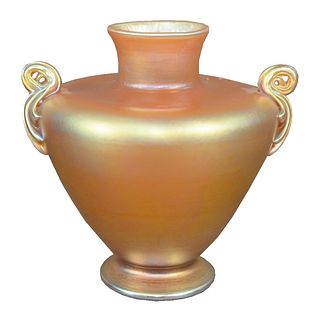 Tiffany Studios Yellow Favrile Glass Vase, having ovoid handled form raised on a circular foot, inscribed "4003G L.C. Tiffany - Favrile" to the unders