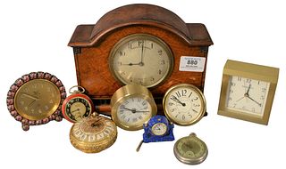 Group of Nine Clocks, to include three Tiffany alarm clocks, mantle clock, etc., heights 1 1/2 to 7 inches.