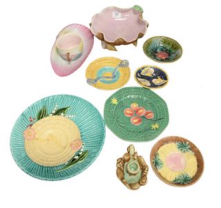 Twelve Piece Lot of Majolica, to include a shell bowl with conch shell feet; a pink shell bowl; one teacup with waterlilies; one seashell motif candle