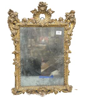 Italian Carved Giltwood Framed Mirror, 18th century or later, height 26 inches, width 17 1/2 inches.