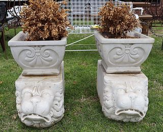 A Vintage of Stone Planters On Marble Stands.