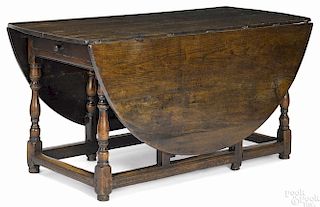 Large George I yewwood gateleg dining table, ca. 1730, 28 1/2'' h., 26'' w., 59 1/2'' d.