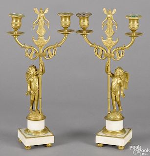 Pair of French gilt bronze and marble candelabra, ca. 1900, with putti supports, 15 1/2'' h.
