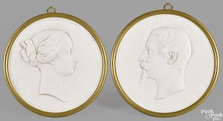 Pair of Sevres bisque porcelain relief silhouettes, 19th c., of Emperor Napoleon III
