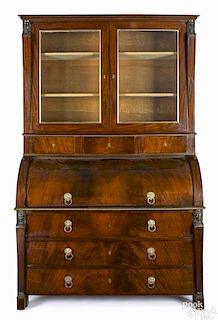 Belgian Empire mahogany cylinder top desk and bookcase, early 19th c., with ormolu mounts