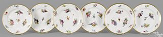 Set of six Sevres painted porcelain plates, 1822, decorated with floral sprays, 8 3/4'' dia.