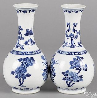 Pair of Chinese Qing dynasty blue and white porcelain bottle vases, 8 3/8'' h.