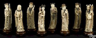 Rare set of eight Asian carved and polychrome decorated ivory figures, ca. 1900, 9 3/4'' h.
