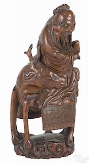 Chinese carved bamboo figure of Shou Loa, 18th c., depicted atop an elk, 10 3/4'' h.