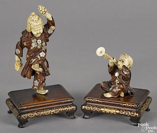 Two Japanese Meiji period carved ivory and wood figures of young musicians with abalone appliqués