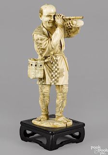 Large Japanese Meiji period carved ivory figure of a man with a spyglass, 14 1/4'' h.