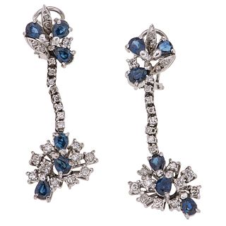 PAIR OF EARRINGS WITH SAPPHIRES AND DIAMONDS IN PALLADIUM SILVER 12 Pear cut sapphires ~2.64 ct and 46 8x8 cut diamonds ~0.80 ct