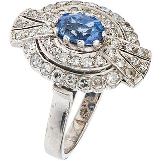RING WITH SAPPHIRES AND DIAMONDS IN 14K WHITE GOLD 1 Oval cut sapphire ~0.75 ct and 44 8x8 cut diamonds~0.68 ct. Size: 7 ¼