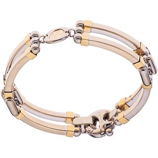 BRACELET IN YELLOW AND WHITE 18K GOLD Weight: 49.8 g. Length: 8.2" (21.0 cm)