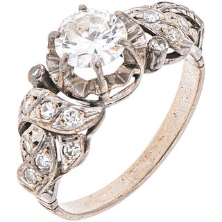 RING WITH DIAMONDS IN PALLADIUM SILVER 1 Brilliant cut diamonds ~0.75 ct Clarity: SI2 - I1 Color: J-K. Weight: 3.1 g. Size: 6 ¾