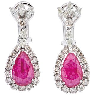 PAIR OF EARRINGS WITH RUBIES AND DIAMONDS IN 18K WHITE GOLD 2 Pear cut rubies ~4.55 ct and 40 Diamonds (different cuts) ~2.36 ct